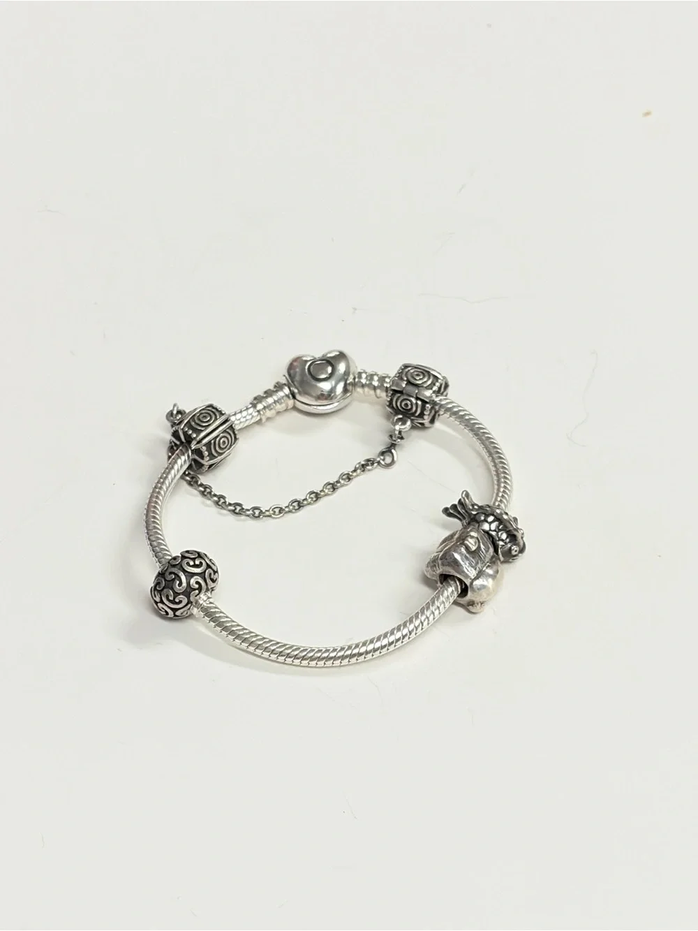 PANDORA Moments Sterling Silver Bracelet with Heart Clasp and charms